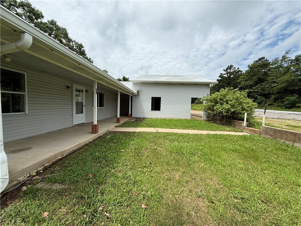 4250 AR 7 Jasper, AR 72641 - Photo 26 of 47 Exterior with horizontal siding and a covered porch