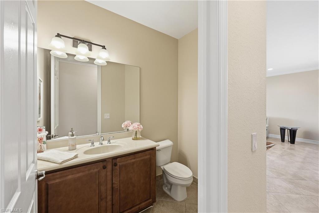 6532 Monterey Point, Unit 202 Naples, FL 34105 - Photo 31 of 50 1/2 bath off hall