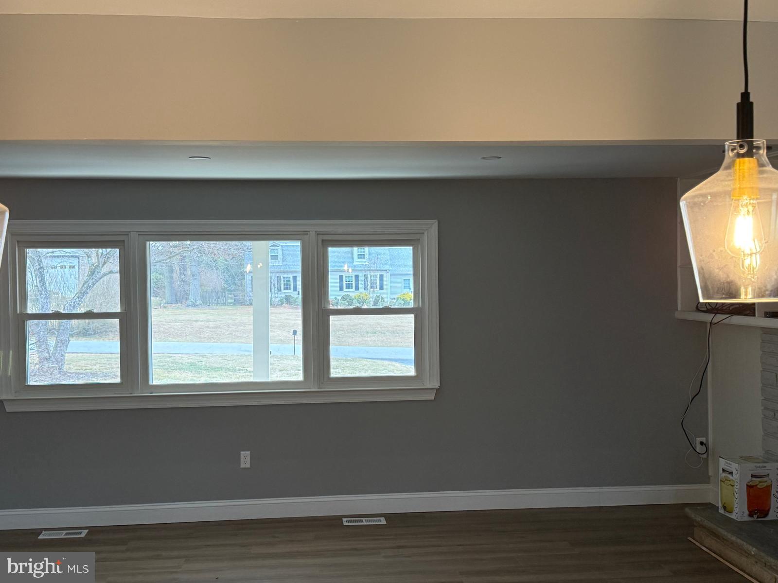 7542 Cherry Tree Drive Fulton, MD 20759 - Photo 13 of 22 a view of empty room with wooden floor and fan