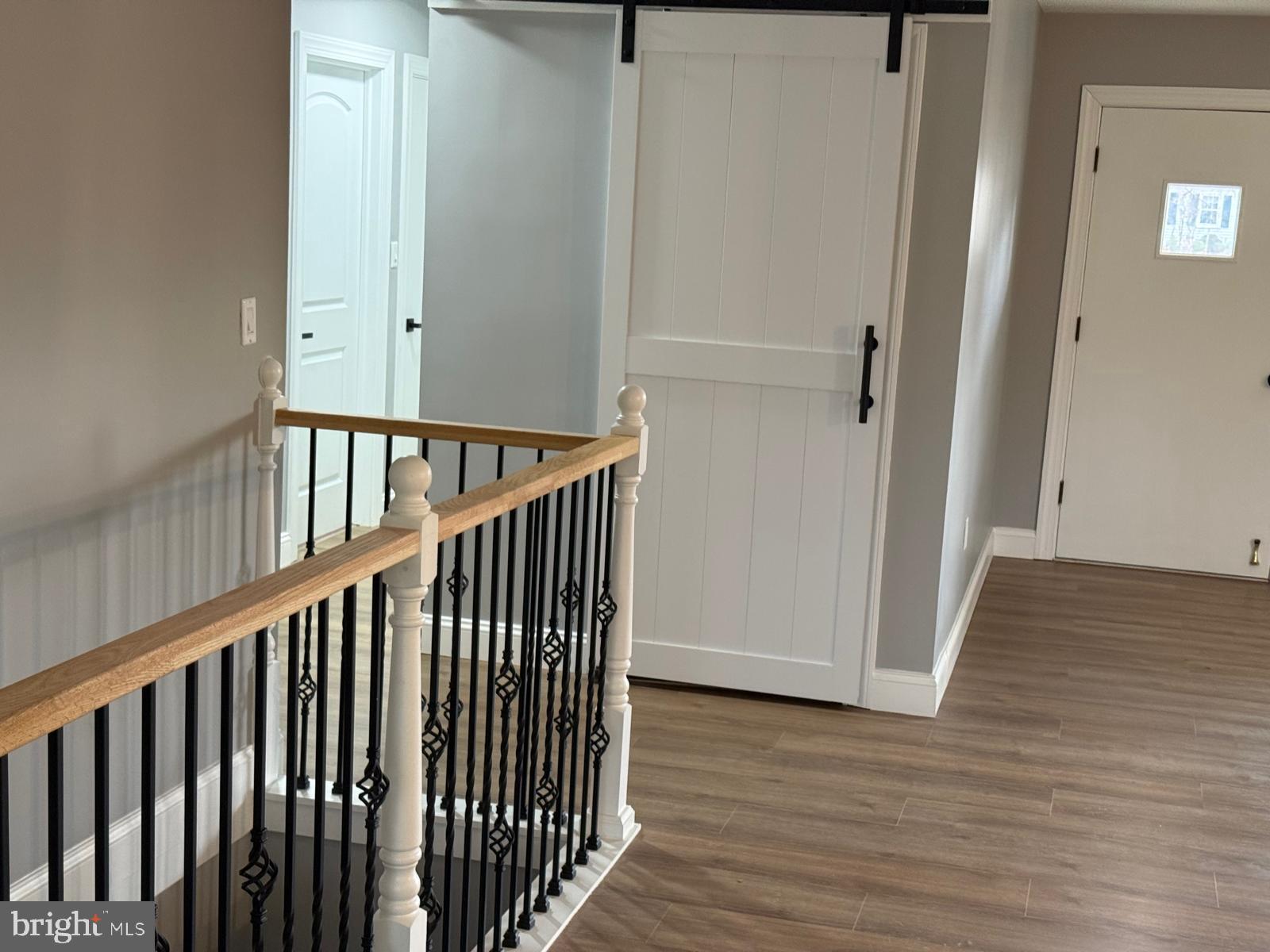 7542 Cherry Tree Drive Fulton, MD 20759 - Photo 14 of 22 a view of staircase with railing and white walls