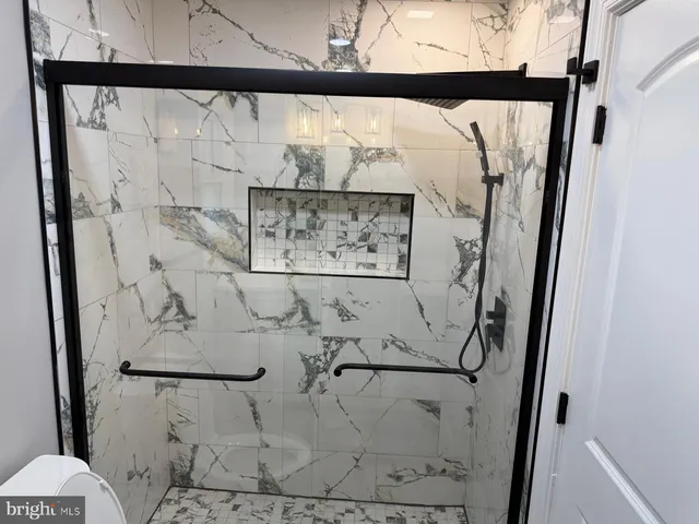 a bathroom with a toilet and a sink