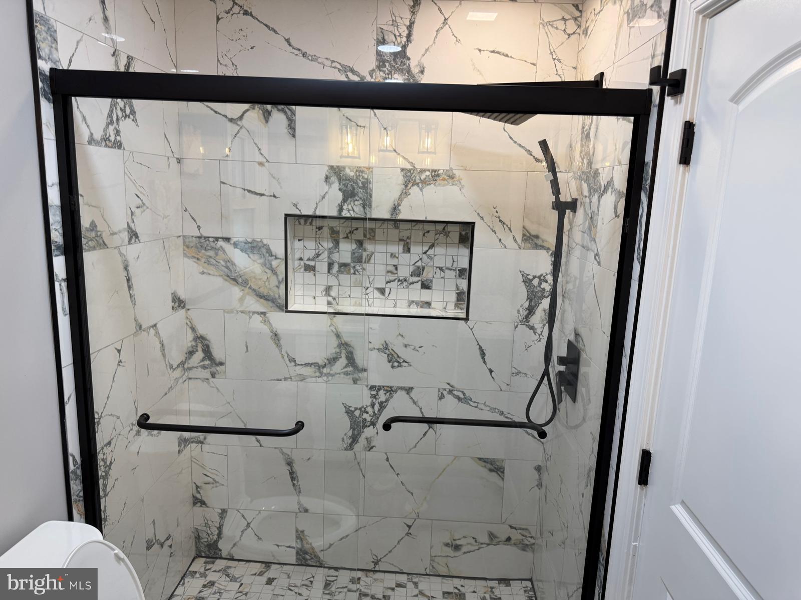 7542 Cherry Tree Drive Fulton, MD 20759 - Photo 16 of 22 a picture of door and has a painting of a bathroom