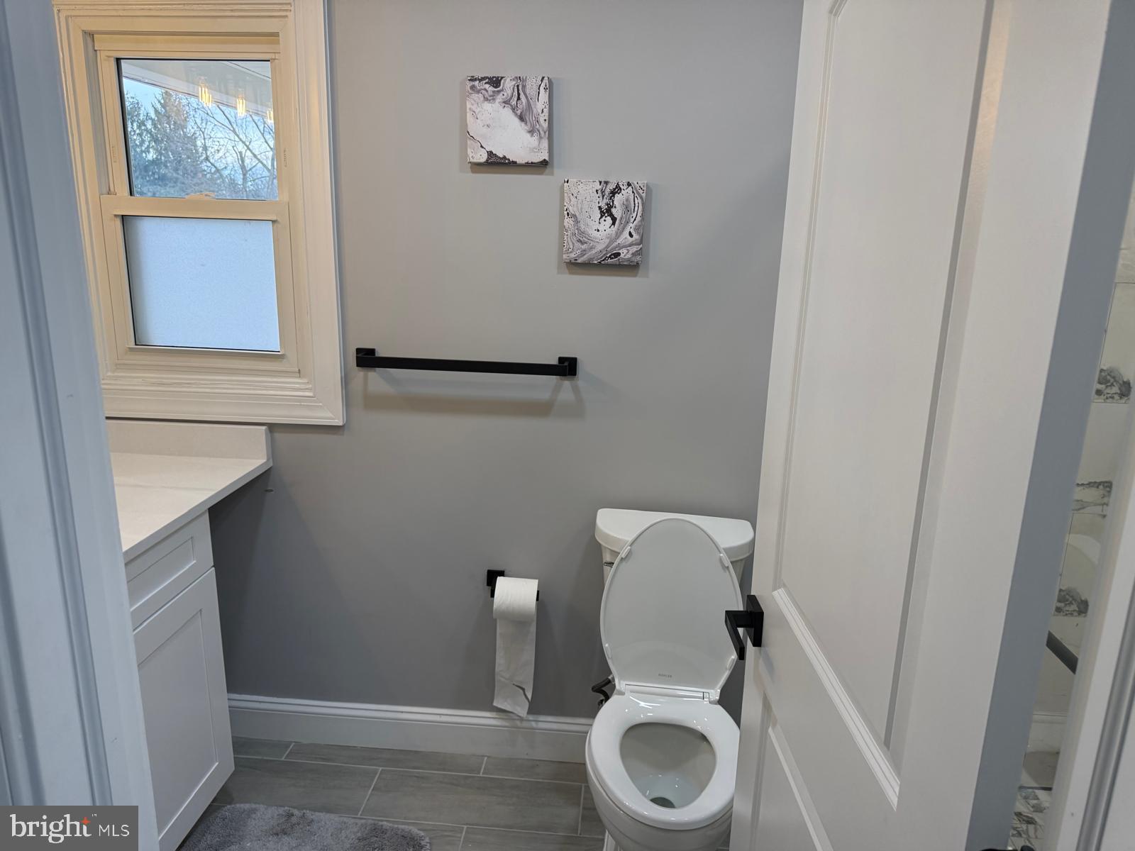 7542 Cherry Tree Drive Fulton, MD 20759 - Photo 17 of 22 a bathroom with a toilet and a sink