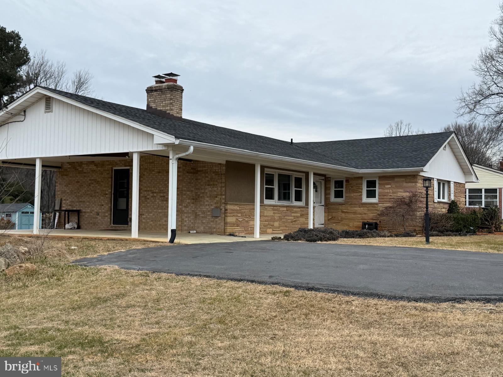 7542 Cherry Tree Drive Fulton, MD 20759 - Photo 2 of 22 a front view of a house with a yard
