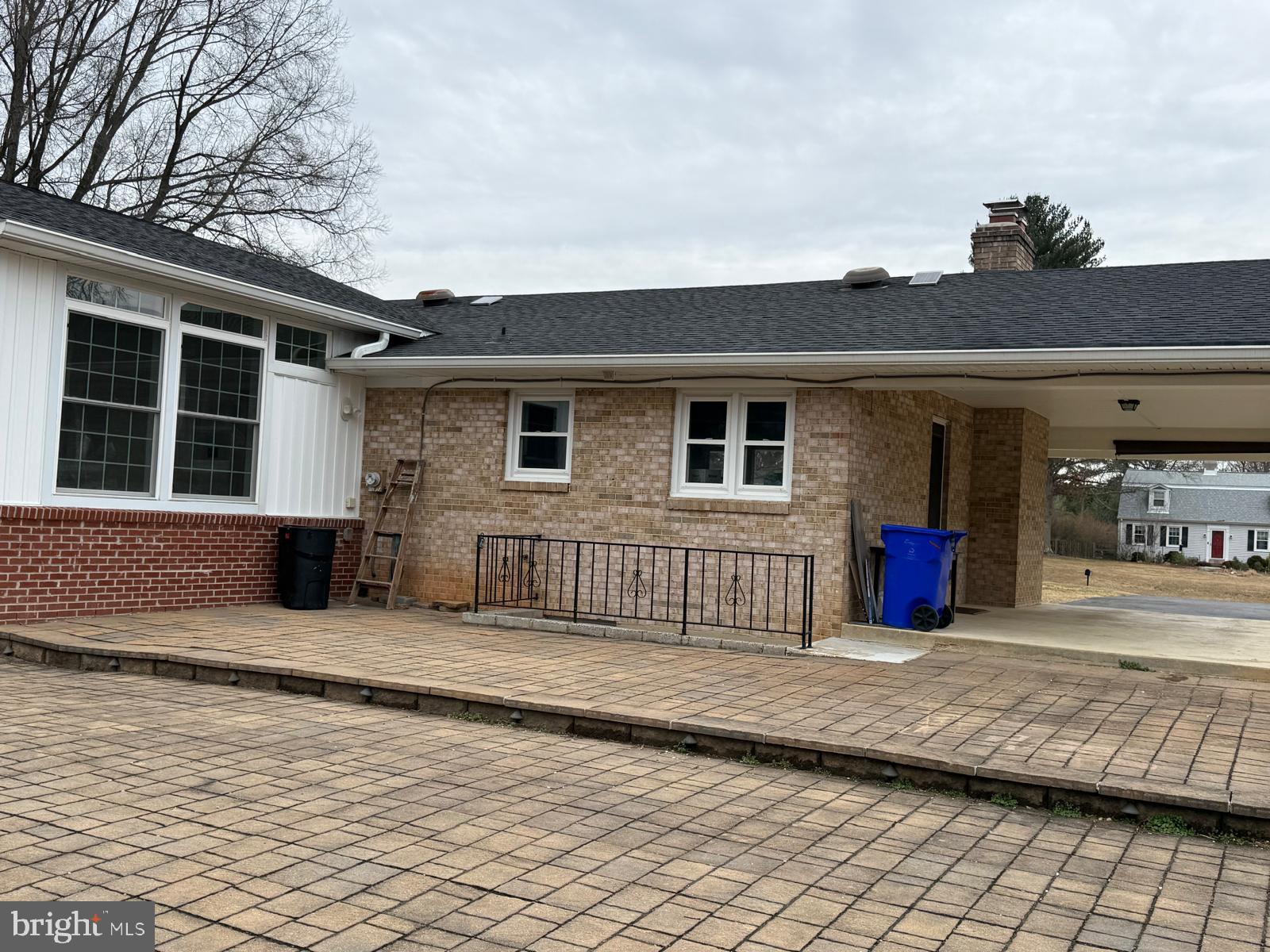 7542 Cherry Tree Drive Fulton, MD 20759 - Photo 3 of 22 a view of a house with a wooden fence