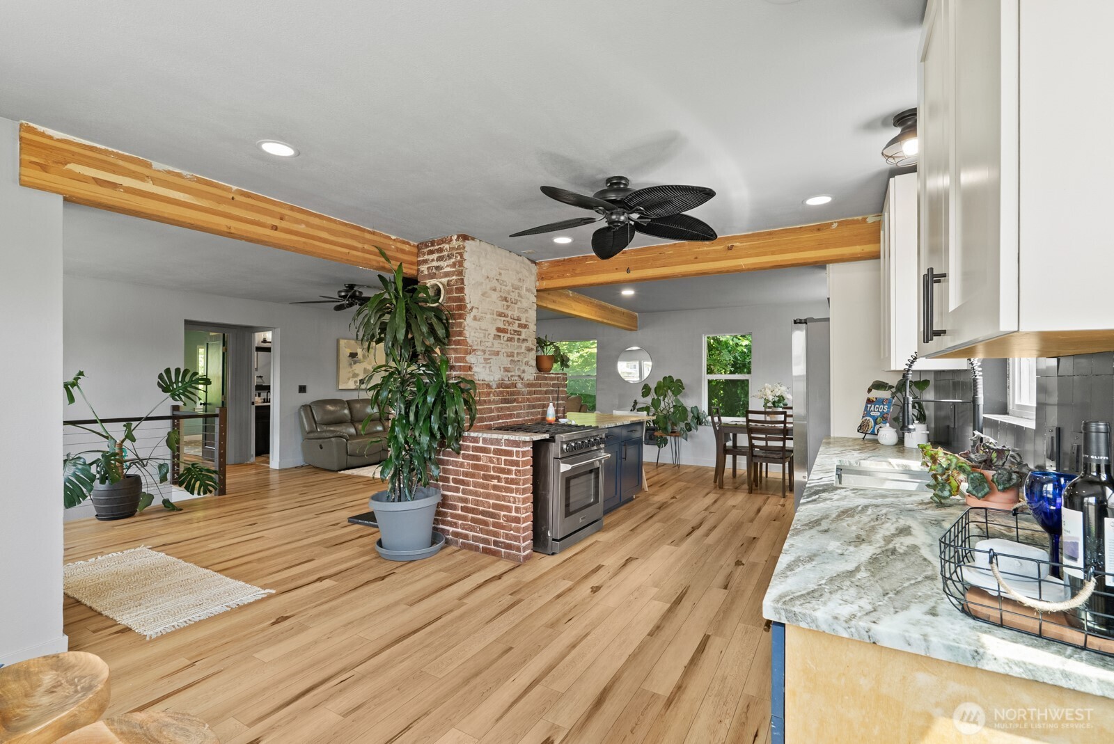 307 4th Street Steilacoom, WA 98388 - Photo 11 of 39 a living room with furniture and wooden floor