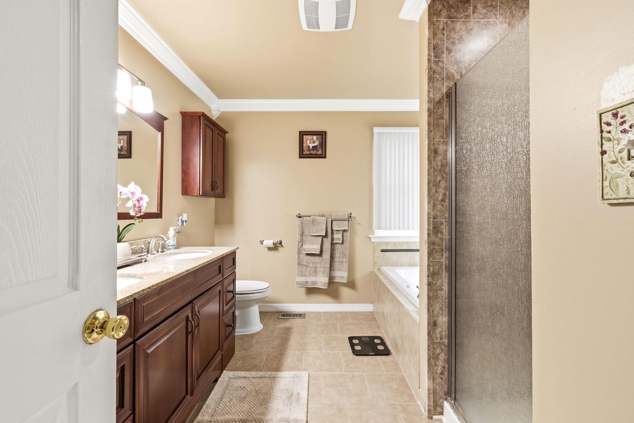 17 Paddock Road Marlton, NJ 08053 - Photo 31 of 54 Elegant primary bathroom with warm tones.