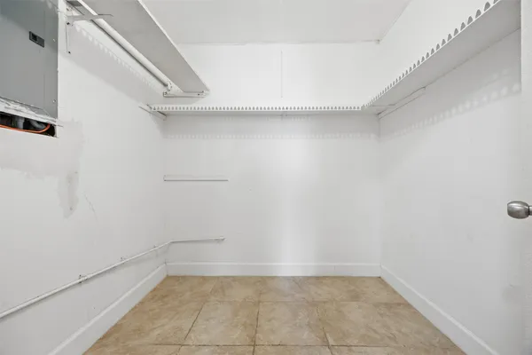 a view of an empty walk in closet
