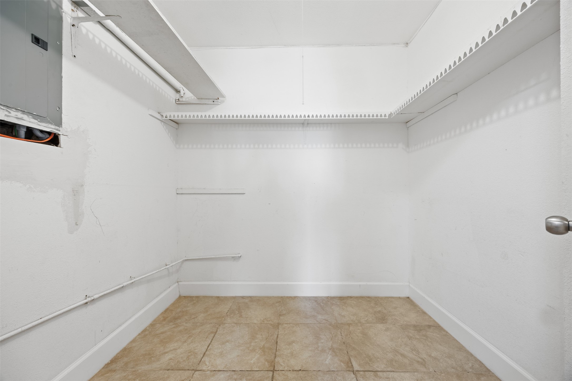6715 Rowell Court Houston, TX 77489 - Photo 15 of 24 a view of an empty walk in closet