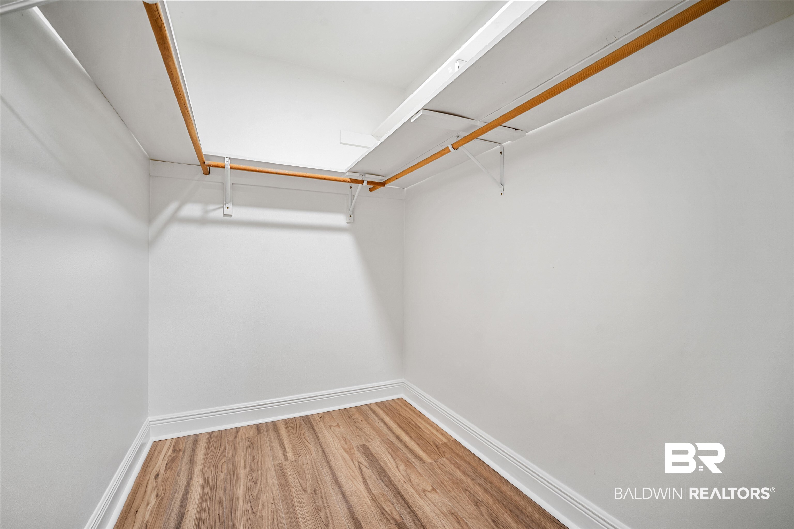3050 Lacoste Road Mobile, AL 36618 - Photo 18 of 30 Spacious closet featuring wood finished floors