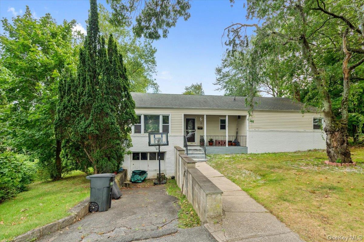 101 Cresthill Road Yonkers, NY 10710 - Photo 2 of 31 a view of a house with backyard and sitting area