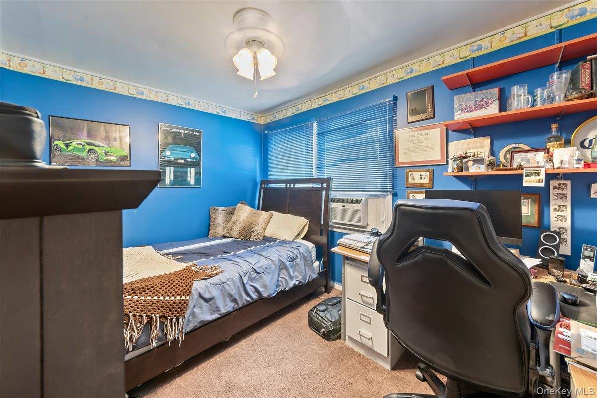 101 Cresthill Road Yonkers, NY 10710 - Photo 22 of 31 a bedroom with bed and a window