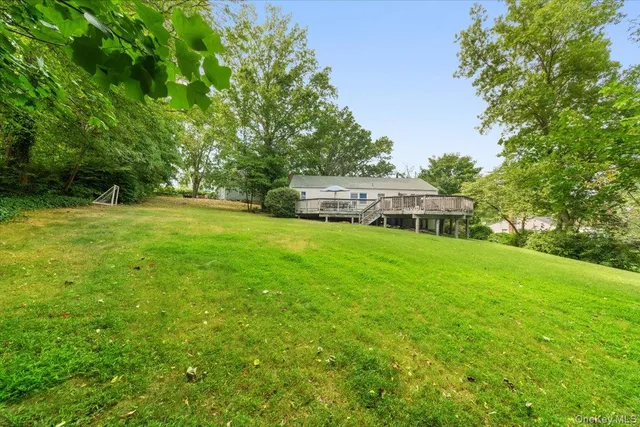 a view of a house with a big yard