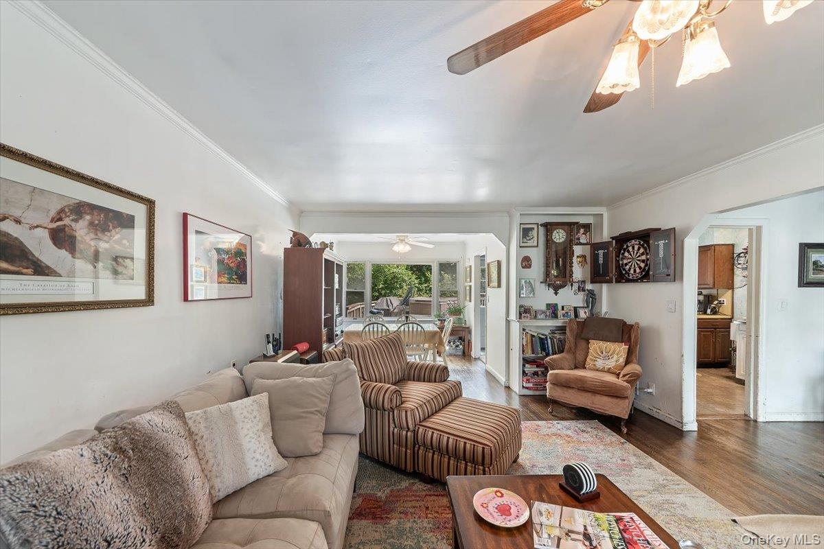 101 Cresthill Road Yonkers, NY 10710 - Photo 6 of 31 a living room with furniture and a large window