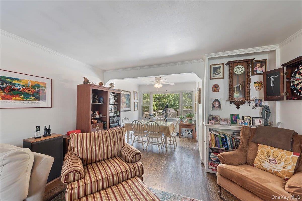 101 Cresthill Road Yonkers, NY 10710 - Photo 7 of 31 a living room with furniture or couch and a floor to ceiling window