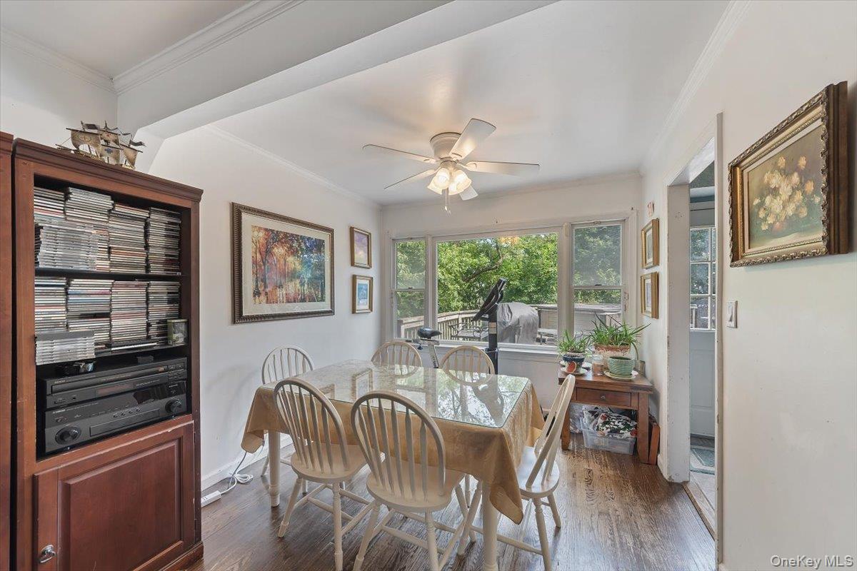 101 Cresthill Road Yonkers, NY 10710 - Photo 8 of 31 a view of a dining room with furniture window and wooden floor