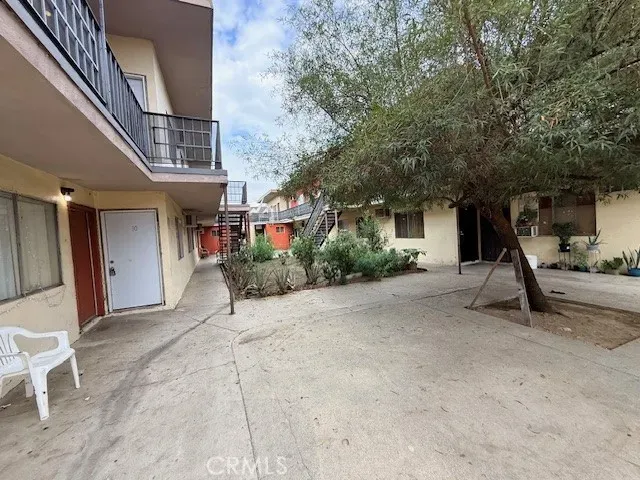 a view of a house with a street