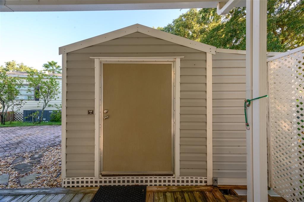 20285 Highway 27, Unit 8 Clermont, FL 34715 - Photo 13 of 16 a front view of a house with a yard
