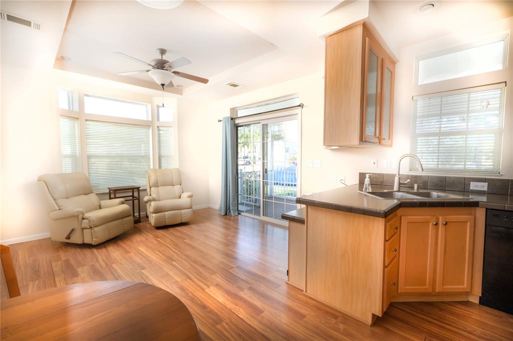 20285 Highway 27, Unit 8 Clermont, FL 34715 - Photo 3 of 16 a living room with granite countertop furniture and a large window