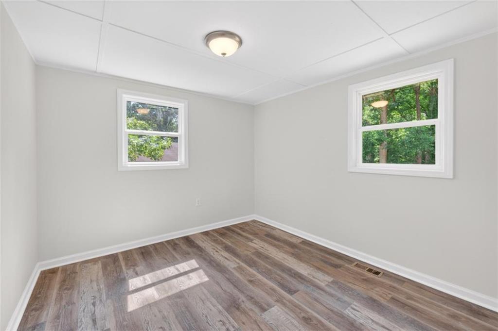136 Nowell Street Monroe, GA 30655 - Photo 24 of 25 an empty room with windows