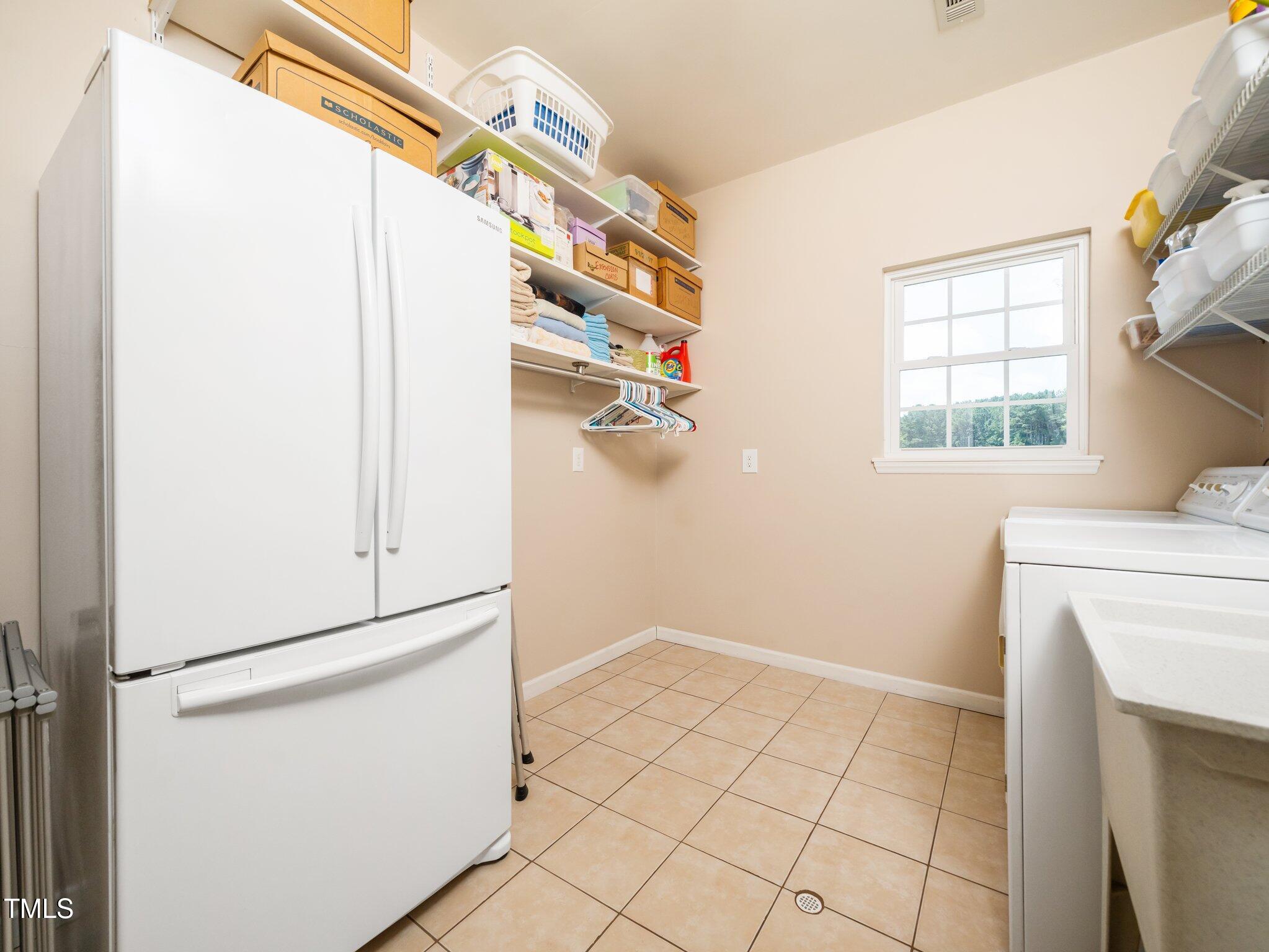 8917 Thompson Mill Road Wake Forest, NC 27587 - Photo 17 of 42 a view of utility room