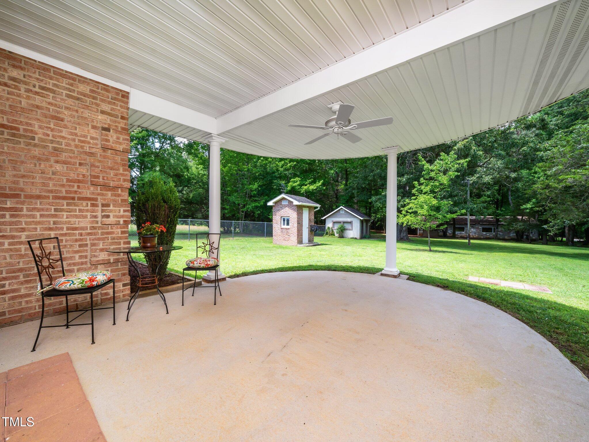 8917 Thompson Mill Road Wake Forest, NC 27587 - Photo 26 of 42 a garden view with a seating space