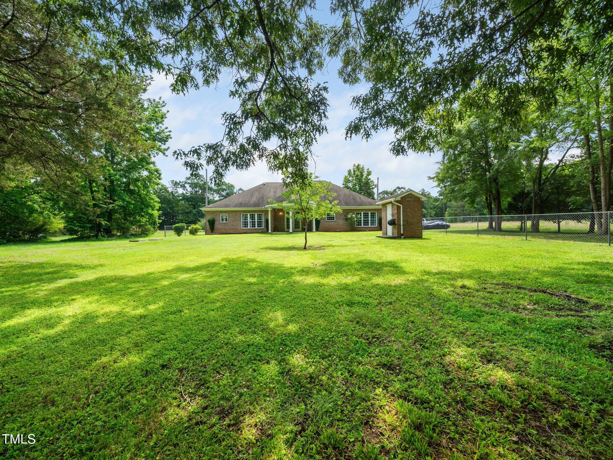 8917 Thompson Mill Road Wake Forest, NC 27587 - Photo 30 of 42 a view of a park with large trees