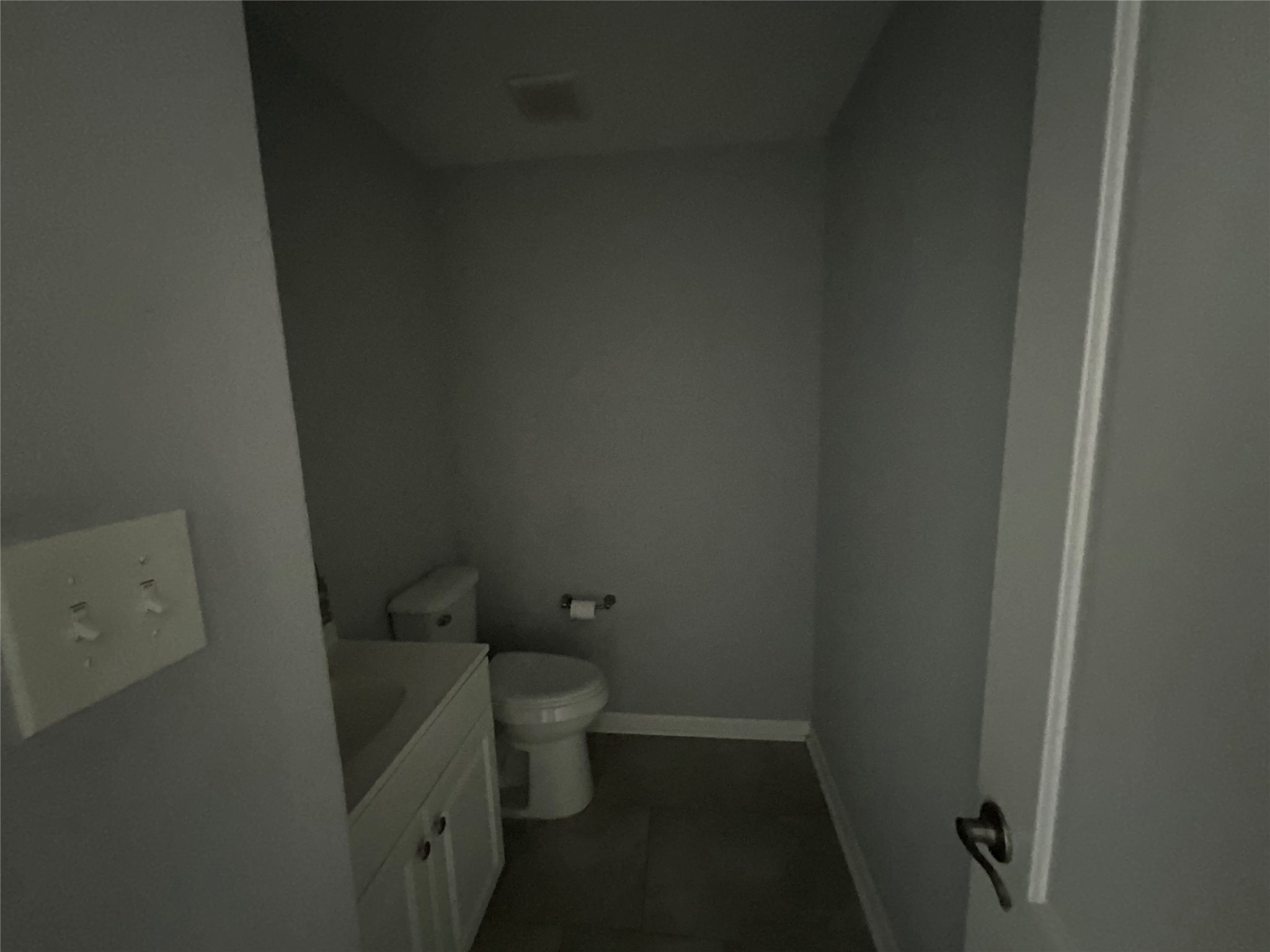 239 Old Firetower Road Bastrop, TX 78602 - Photo 26 of 39 Hall Bathroom featuring vanity and dark tile patterned flooring