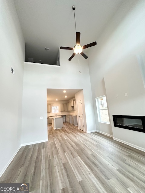116 Deer Crossing Temple, GA 30179 - Photo 6 of 29 a view of a room with a ceiling fan and a window