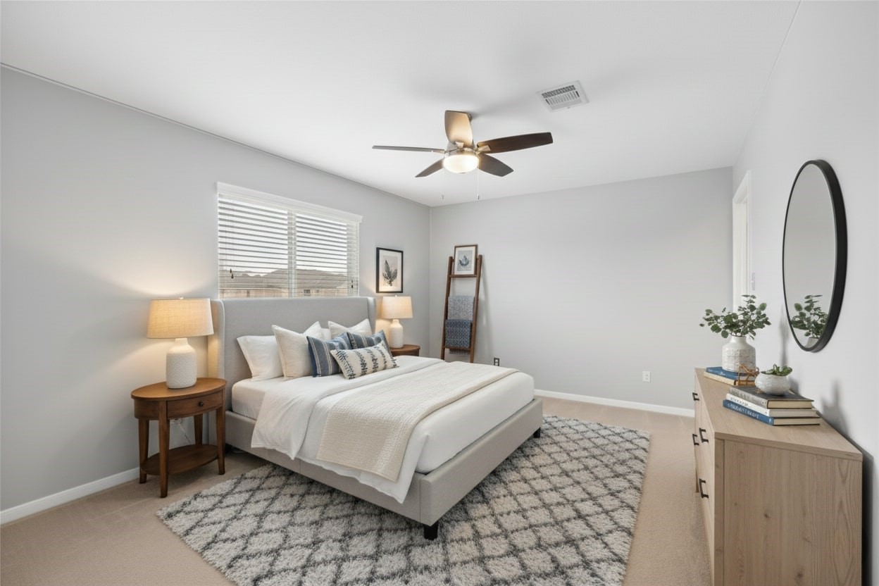 1193 Stallion Ridge Alvin, TX 77511 - Photo 12 of 14 a bedroom with a bed and a table