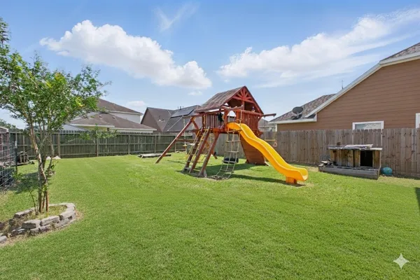 a view of a house with a park