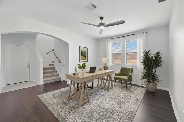 a view of a dining room with furniture