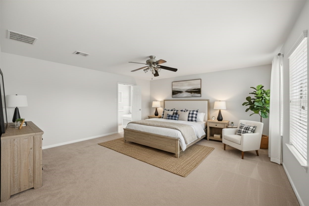 1193 Stallion Ridge Alvin, TX 77511 - Photo 8 of 14 a spacious bedroom with a bed and a couch