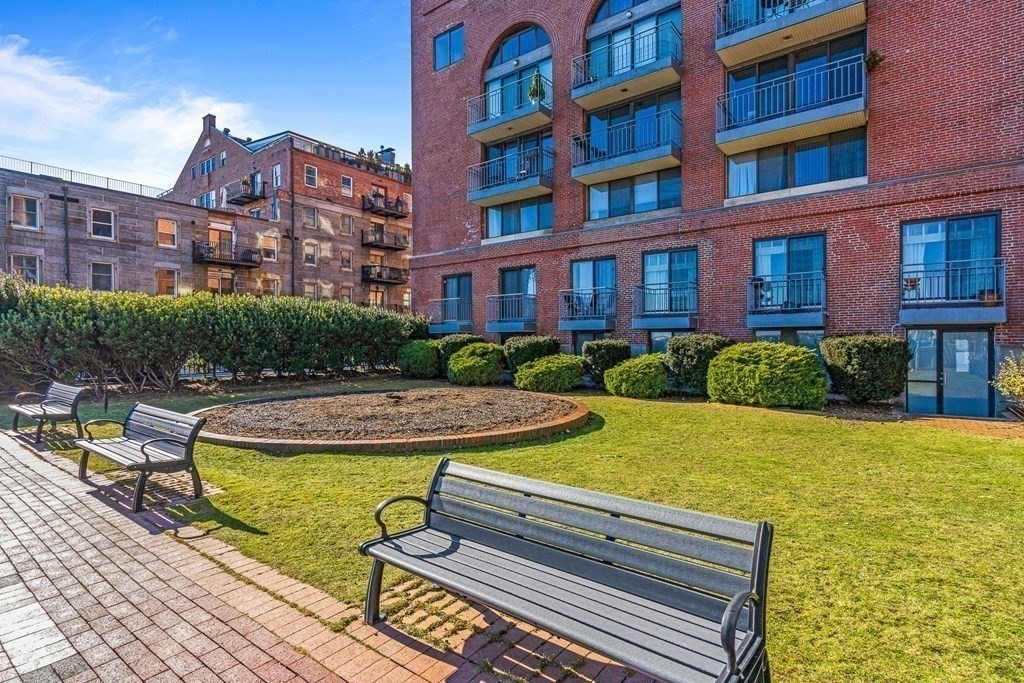 357 Commercial Street, Unit 617 Boston, MA 02109 - Photo 3 of 15 a view of a swimming pool with a lounge chairs