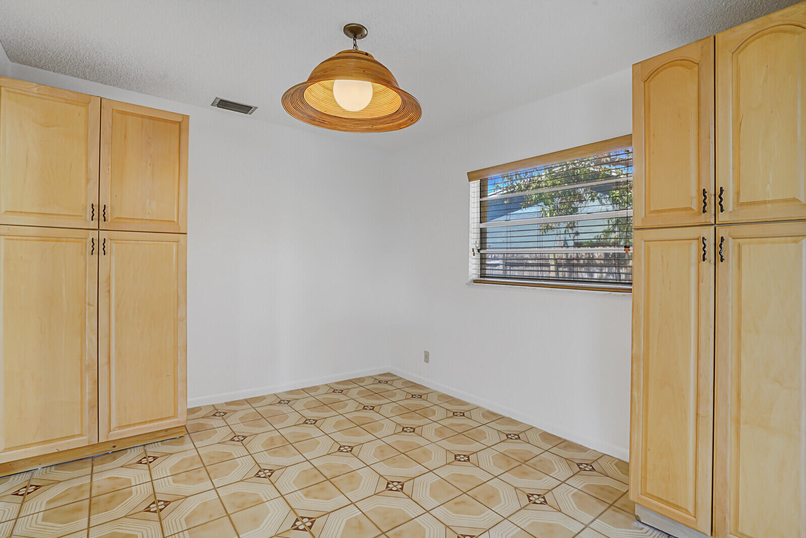 9260 Southwest 16th Road West Boca Raton, FL 33428 - Photo 13 of 46 an empty room with windows