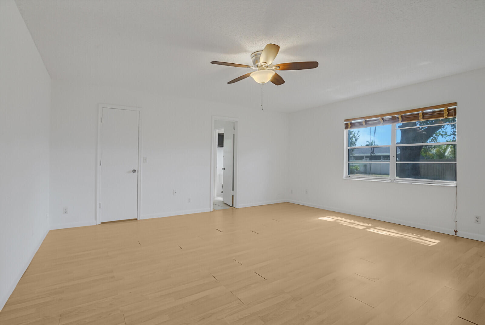 9260 Southwest 16th Road West Boca Raton, FL 33428 - Photo 20 of 46 a view of an empty room with a window
