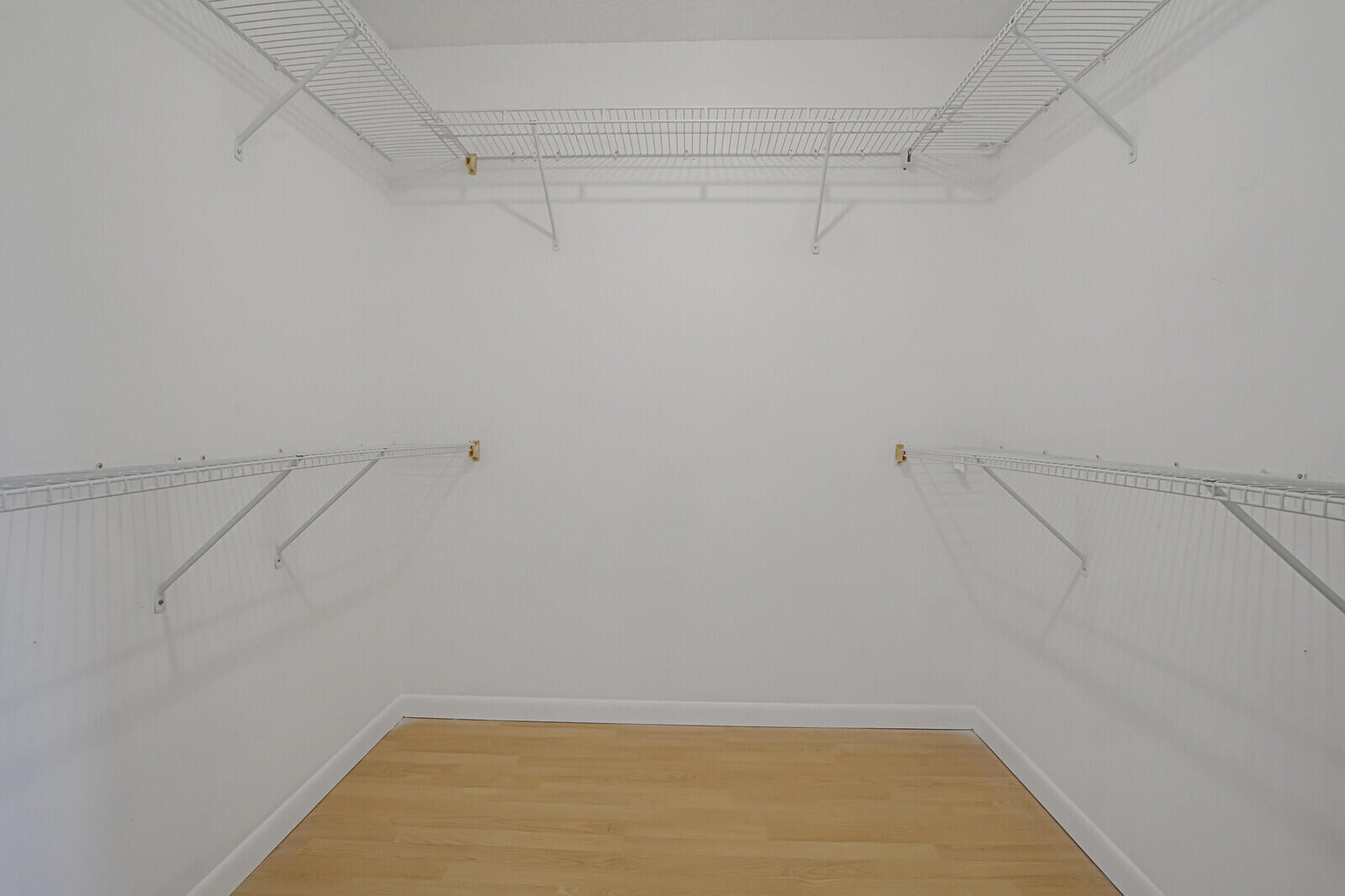 9260 Southwest 16th Road West Boca Raton, FL 33428 - Photo 22 of 46 a view of a room with racks on the wall