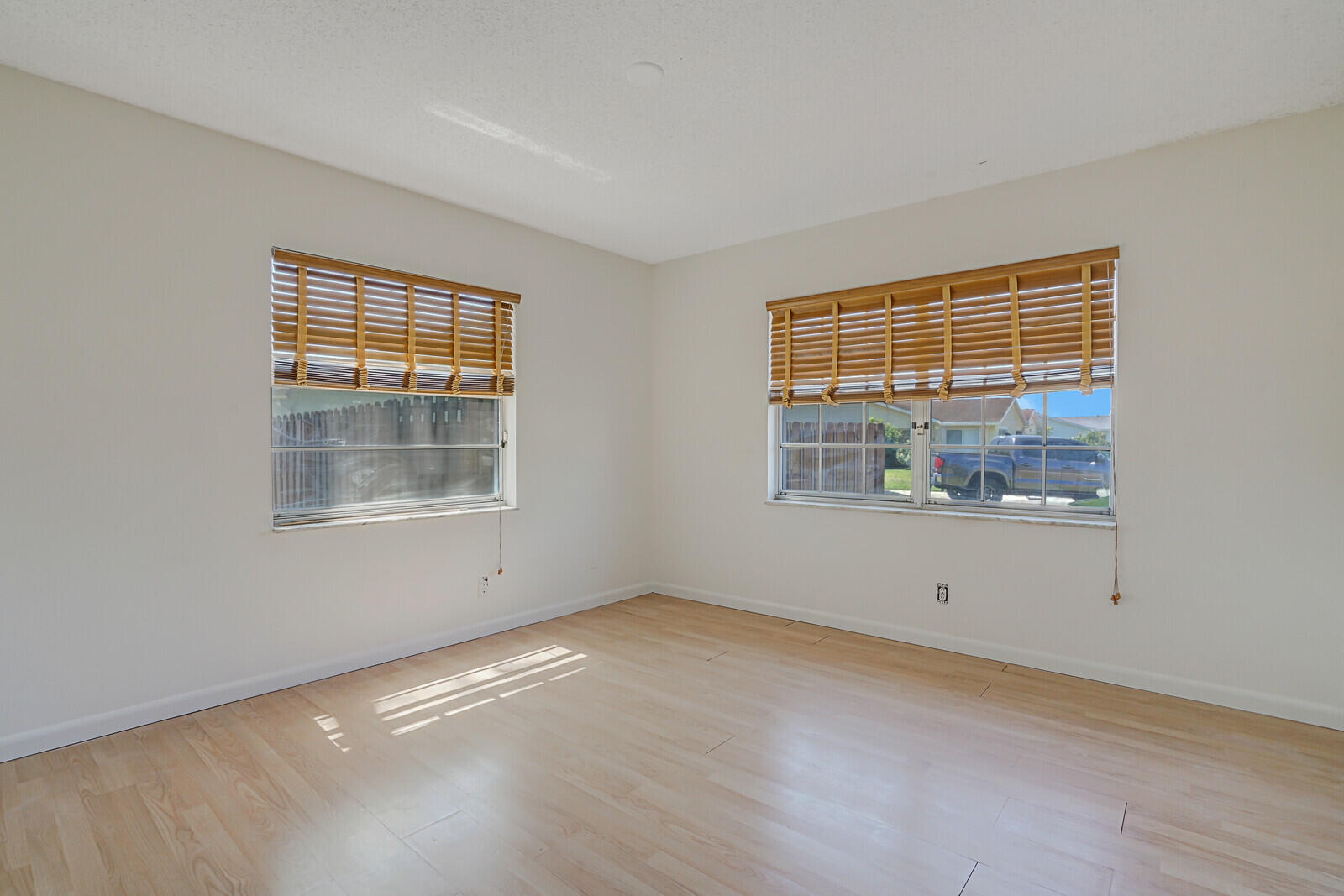 9260 Southwest 16th Road West Boca Raton, FL 33428 - Photo 25 of 46 a view of an empty room with a window