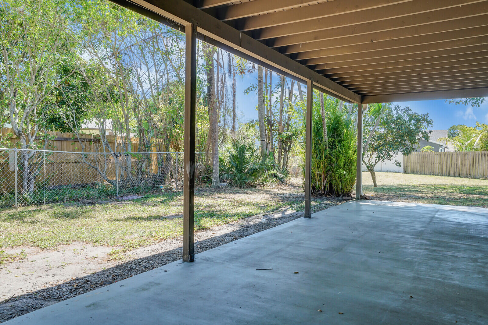 9260 Southwest 16th Road West Boca Raton, FL 33428 - Photo 26 of 46 a view of a porch with a backyard