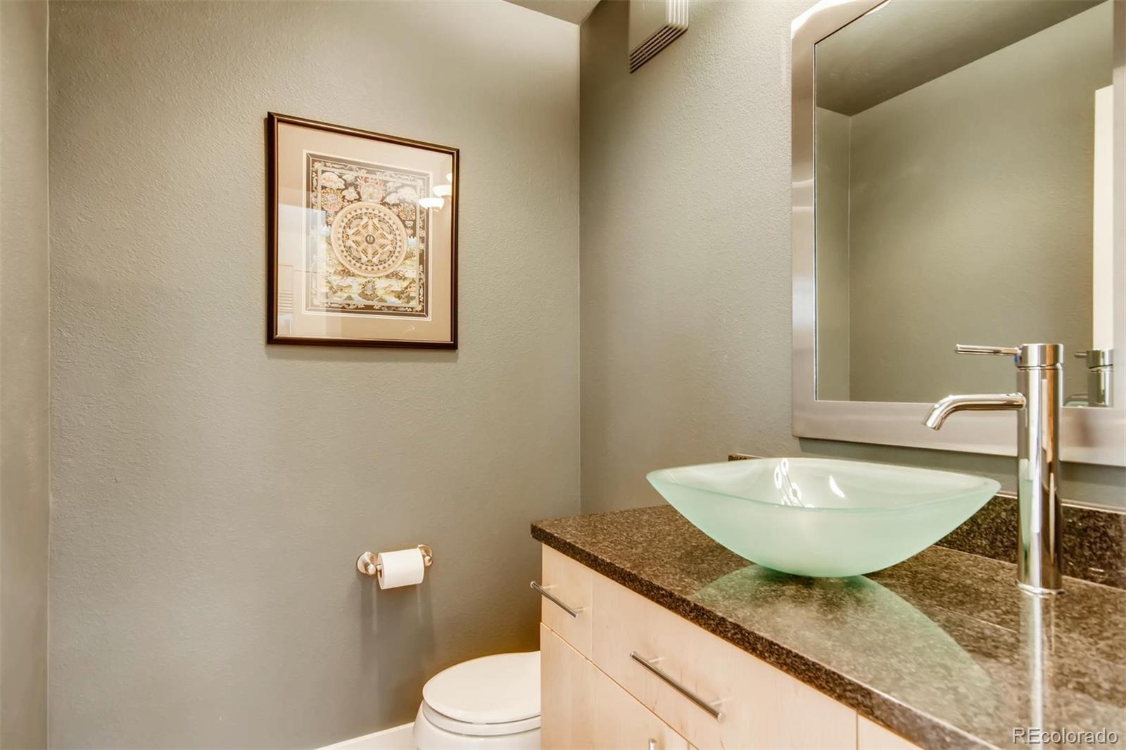 3231 Perry Street Denver, CO 80212 - Photo 11 of 36 a bathroom with a granite countertop sink and a mirror