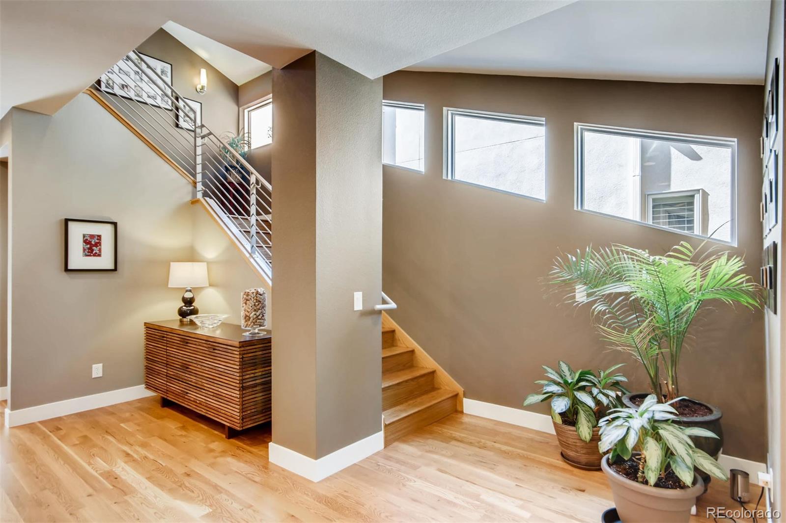 3231 Perry Street Denver, CO 80212 - Photo 12 of 36 a living room with furniture and a potted plant
