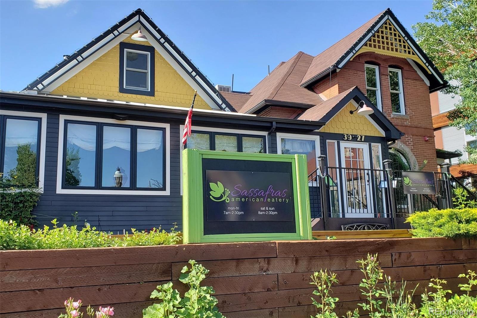 3231 Perry Street Denver, CO 80212 - Photo 36 of 36 a front view of a house with garden