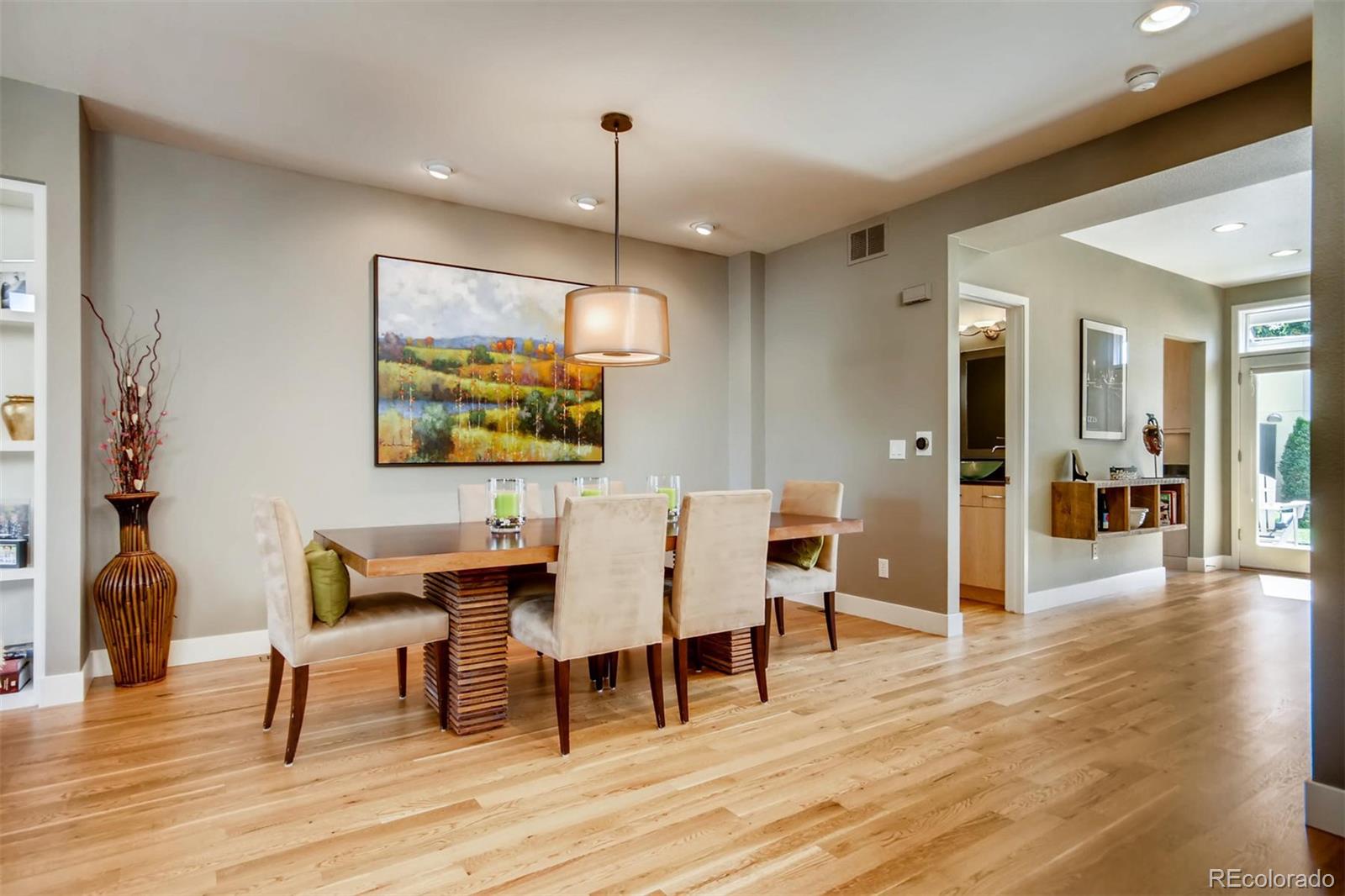3231 Perry Street Denver, CO 80212 - Photo 6 of 36 a view of a a dining room with furniture window and wooden floor