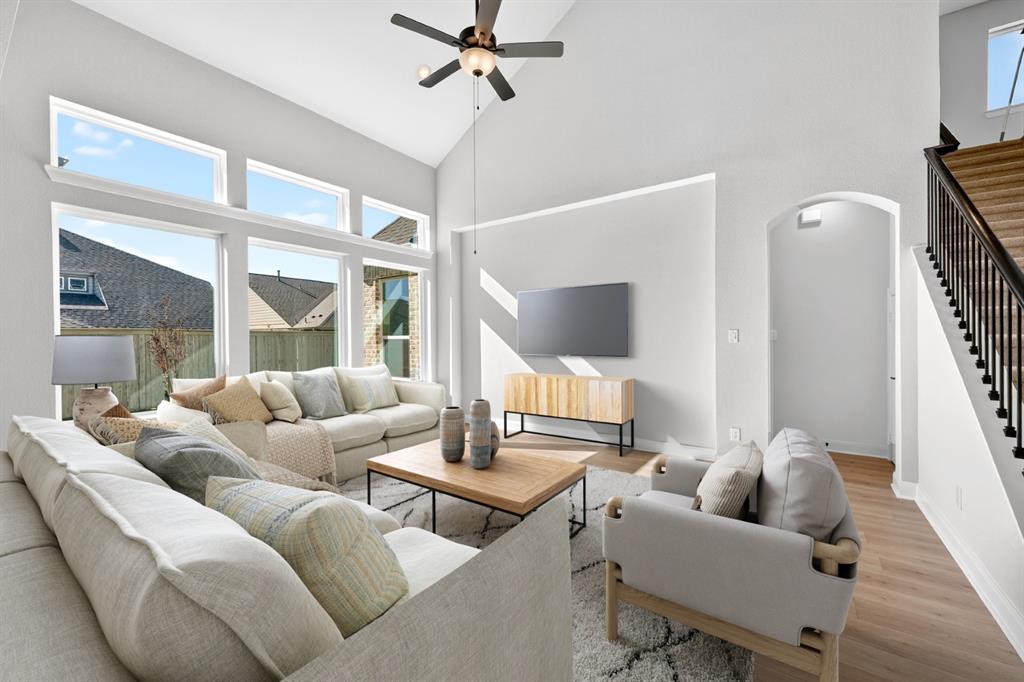 2109 Chance Lane Northlake, TX 76247 - Photo 12 of 36 a living room with furniture and a large window
