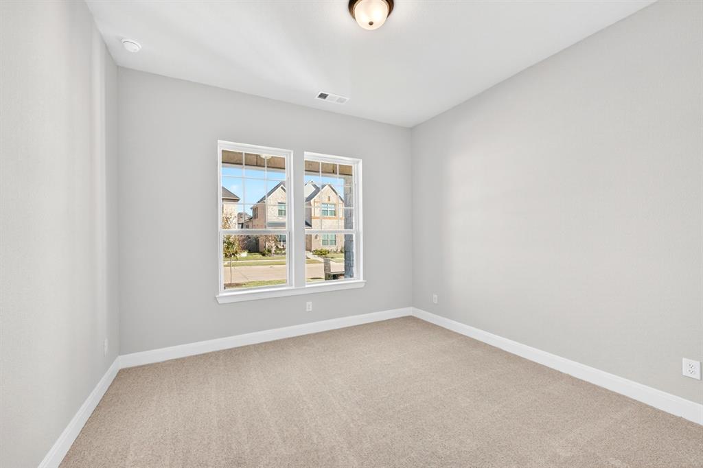 2109 Chance Lane Northlake, TX 76247 - Photo 19 of 36 an empty room with a window