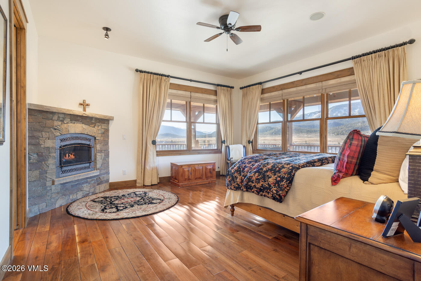 34900 Colorado River Road McCoy, CO 80463 - Photo 20 of 41 a living room with furniture and a fireplace