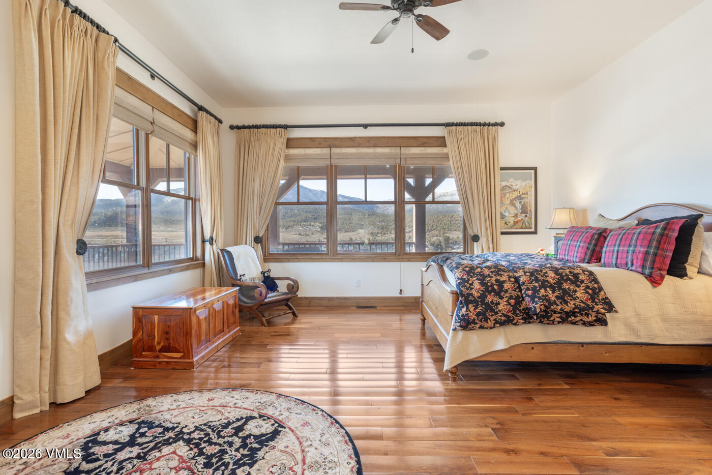 34900 Colorado River Road McCoy, CO 80463 - Photo 21 of 41 a bedroom with a large bed and a larger window with the outer view