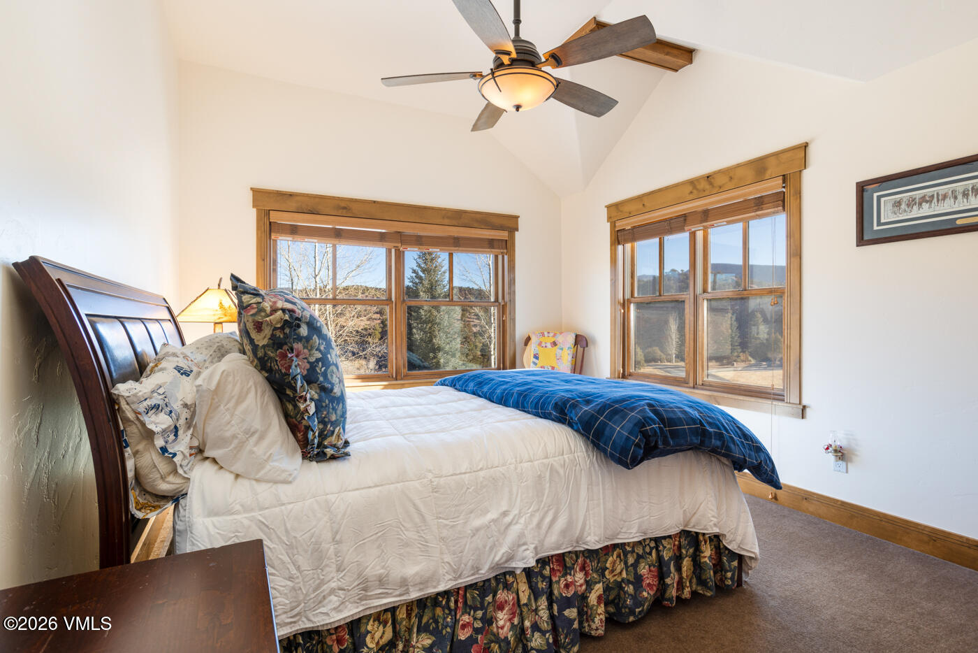 34900 Colorado River Road McCoy, CO 80463 - Photo 30 of 41 a bedroom with a bed and wooden floor