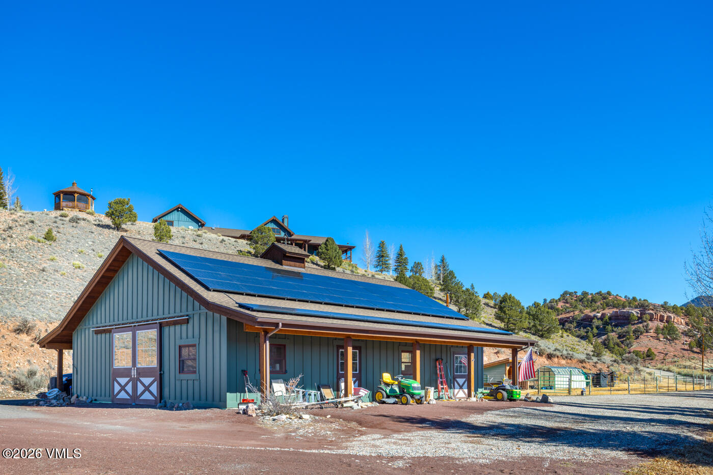 34900 Colorado River Road McCoy, CO 80463 - Photo 36 of 41 a front view of a house with a yard and garage