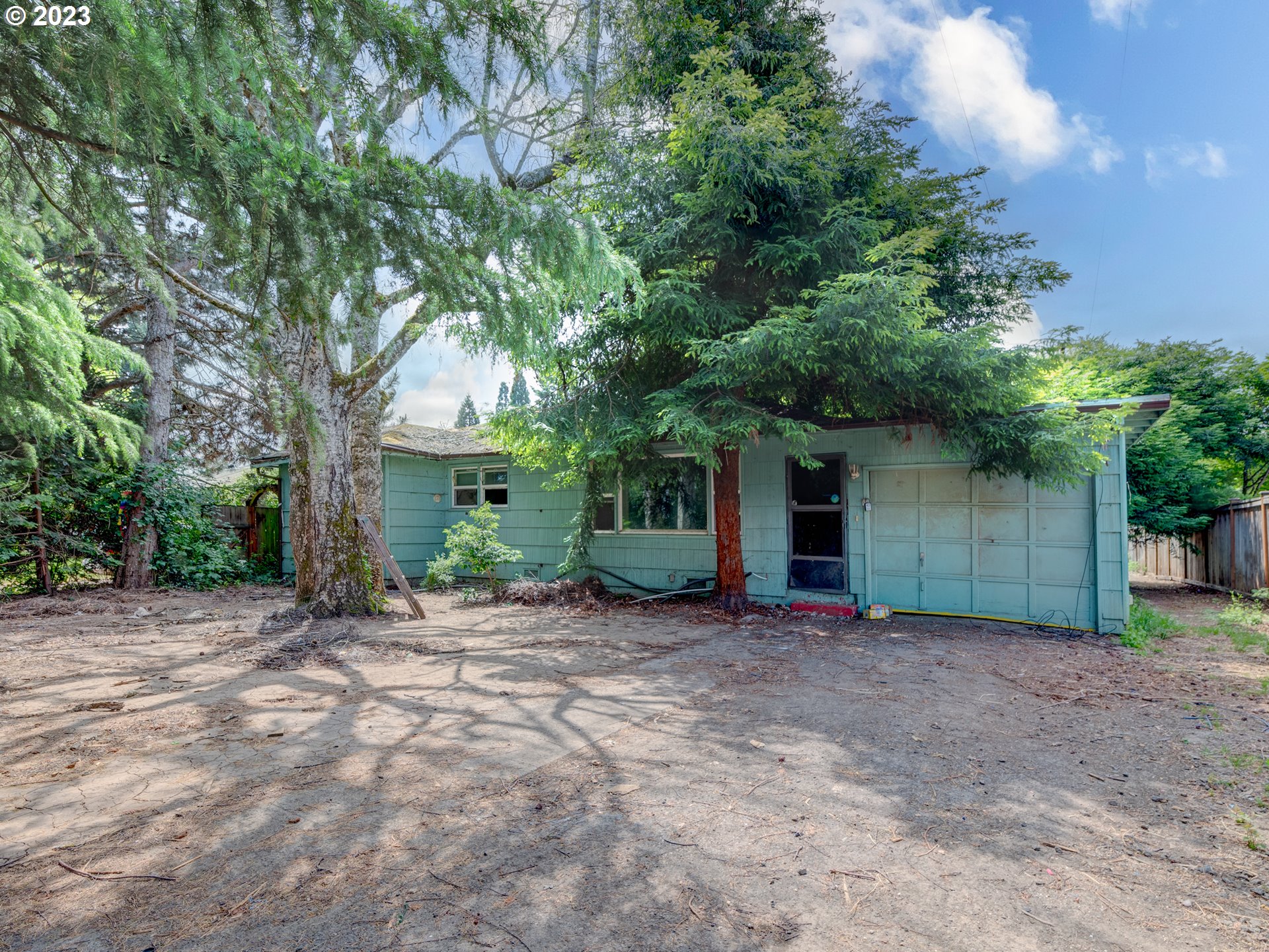 3350 Oriole Street Springfield, OR 97477 - Photo 12 of 15 a front view of a house with a garden